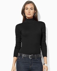 A classic long-sleeved turtleneck is crafted in soft cotton for easy style and comfort.