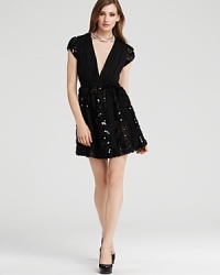 This Mark + James cap-sleeve dress boasts a seriously charming silhouette finished with a sparkling sequin-adorned skirt. This Mark + James cap-sleeve dress boasts a seriously charming silhouette finished with a sparkling sequin-adorned skirt.