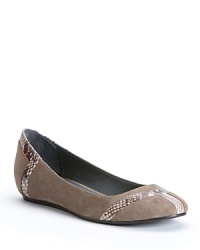 Netural suede flats up their fashion quotient with snakeskin-embossed details, in modern, Calvin Klein style. Netural suede flats up their fashion quotient with snakeskin-embossed details, in modern, Calvin Klein style.