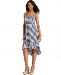 Think summer with Spense's petite smocked dress, featuring a classic stripe and on-trend high-low hem that's longer at the back. (Clearance) Think summer with Spense's petite smocked dress, featuring a classic stripe and on-trend high-low hem that's longer at the back. (Clearance)