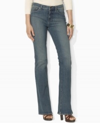 Lauren Jeans Co.'s essential denim jean features a slim, straight leg and a hint of stretch for a versatile, modern look. Lauren Jeans Co.'s essential denim jean features a slim, straight leg and a hint of stretch for a versatile, modern look.