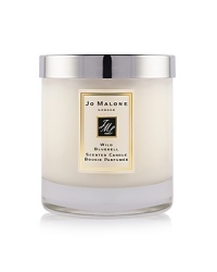 Immerse yourself in a mesmerizing sea of wild flowers, misted with dew. Fresh bluebell, radiant lily of the valley and exquisite eglantine, showered with the sparkling succulence of persimmon and lemon. The Wild Bluebell Home Candle infuses any room with evocative scent and lasts for hours. An everyday luxury, it brings warmth to any environment. Candle burn time is 45 hours. Immerse yourself in a mesmerizing sea of wild flowers, misted with dew. Fresh bluebell, radiant lily of the valley and exquisite eglantine, showered with the sparkling succulence of persimmon and lemon. The Wild Bluebell Home Candle infuses any room with evocative scent and lasts for hours. An everyday luxury, it brings warmth to any environment. Candle burn time is 45 hours.