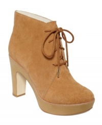 Suede sophistication at towering heights. MICHAEL by Michael Kors' Rosalyn platform booties will be an instant fave. Suede sophistication at towering heights. MICHAEL by Michael Kors' Rosalyn platform booties will be an instant fave.
