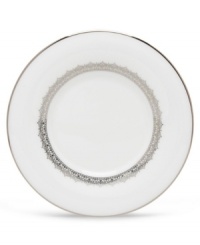 Inspired by the trim on an elegant couture gown, this graceful dinnerware and dishes collection from Lenox features an intricate platinum border that combines harmoniously with white bone china for unparalleled style. Inspired by the trim on an elegant couture gown, this graceful dinnerware and dishes collection from Lenox features an intricate platinum border that combines harmoniously with white bone china for unparalleled style.
