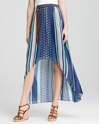 Imbuing your wardrobe with island charm, this asymmetric Sanctuary skirt flaunts a vibrant print that beckons thoughts of tranquil seas and sandy shores. Imbuing your wardrobe with island charm, this asymmetric Sanctuary skirt flaunts a vibrant print that beckons thoughts of tranquil seas and sandy shores.