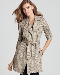 This Bailey 44 coat turns the traditional one-color trench coat upside down with an of-the-moment metallic leopard print--two of fall's leading trends combined. This Bailey 44 coat turns the traditional one-color trench coat upside down with an of-the-moment metallic leopard print--two of fall's leading trends combined.