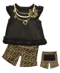Go bold. Start her unique style early with this fun, ruffly shirt and short set from Baby Essentials. Go bold. Start her unique style early with this fun, ruffly shirt and short set from Baby Essentials.