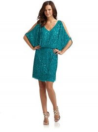 THE LOOKAllover sequinsCutout detail at shouldersV-back with tie detail at neckBack zip with hook-and-eye closureTHE FITAbout 38 from shoulder to hemTHE MATERIAL80% nylon/20% spandexFully linedCARE & ORIGINDry cleanImportedModel shown is 5'11 (180cm) wearing US size 4. THE LOOKAllover sequinsCutout detail at shouldersV-back with tie detail at neckBack zip with hook-and-eye closureTHE FITAbout 38 from shoulder to hemTHE MATERIAL80% nylon/20% spandexFully linedCARE & ORIGINDry cleanImportedModel shown is 5'11 (180cm) wearing US size 4.