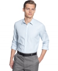 This classic vertical stripe fitted shirt by Calvin Klein should be in every man's closet. This classic vertical stripe fitted shirt by Calvin Klein should be in every man's closet.