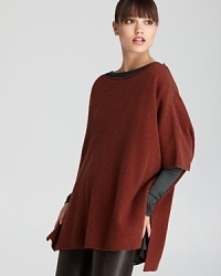 Tailored in a billowy poncho silhouette, this cozy-cool Vince sweater is a must-have layering piece for fall. Tailored in a billowy poncho silhouette, this cozy-cool Vince sweater is a must-have layering piece for fall.