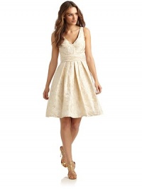 THE LOOKAllover subtle tonal floral brocade printRuched waistbandPleated skirtBack zip with hook-and-eye closureTHE FITAbout 34 shoulder to hemTHE MATERIALPolyesterCARE & ORIGINDry cleanImportedModel shown is 5'10 (177cm) wearing US size 4. THE LOOKAllover subtle tonal floral brocade printRuched waistbandPleated skirtBack zip with hook-and-eye closureTHE FITAbout 34 shoulder to hemTHE MATERIALPolyesterCARE & ORIGINDry cleanImportedModel shown is 5'10 (177cm) wearing US size 4.
