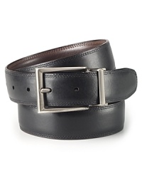 One belt, two looks: this leather belt reverses from textured black to smooth brown to easily coordinate with your clothes. One belt, two looks: this leather belt reverses from textured black to smooth brown to easily coordinate with your clothes.