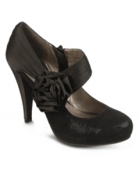 Supreme style that just keeps on going. The Infinitee platform pumps by Fergalicious feature a satin strap across the vamp with large rosette detailing on the side and an inside zipper. Supreme style that just keeps on going. The Infinitee platform pumps by Fergalicious feature a satin strap across the vamp with large rosette detailing on the side and an inside zipper.