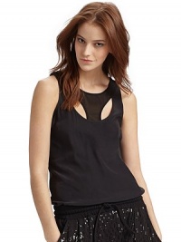 An ultra modern look in washed silk charmeuse, redesigned with chiffon racerstyle detailing at the front and back.Scoopneck Pullover style Sleeveless Chiffon racerstyle details, front and back About 25½ from shoulder to hem Silk with silk chiffon lining Dry clean Imported An ultra modern look in washed silk charmeuse, redesigned with chiffon racerstyle detailing at the front and back.Scoopneck Pullover style Sleeveless Chiffon racerstyle details, front and back About 25½ from shoulder to hem Silk with silk chiffon lining Dry clean Imported