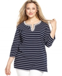 A beaded neckline adds elegant appeal to Jones New York Signature's three-quarter sleeve plus size top, finished by a striped pattern. A beaded neckline adds elegant appeal to Jones New York Signature's three-quarter sleeve plus size top, finished by a striped pattern.
