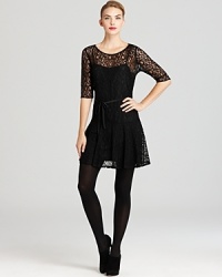 This little black French Connection dress spotlights of-the-moment lace with sheer accents for the party-perfect look you'llreach for occasion after occasion. This little black French Connection dress spotlights of-the-moment lace with sheer accents for the party-perfect look you'llreach for occasion after occasion.