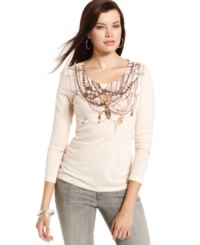 A whimsical status print makes this petite Seven7 top stand out from the crowd! Pair with trendy skinnies for a fashion-forward look. A whimsical status print makes this petite Seven7 top stand out from the crowd! Pair with trendy skinnies for a fashion-forward look.