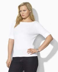 A chic boat neckline lends the ultra-soft cotton shirt, finished with elbow-length sleeves and rolled cuffs, modern, casual appeal. A chic boat neckline lends the ultra-soft cotton shirt, finished with elbow-length sleeves and rolled cuffs, modern, casual appeal.