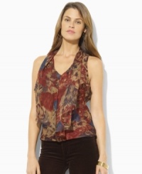A muted floral pattern and flowing georgette construction combine to create Lauren Ralph Lauren's feminine blouse with fluttering ruffles at the front. A muted floral pattern and flowing georgette construction combine to create Lauren Ralph Lauren's feminine blouse with fluttering ruffles at the front.