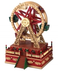 Join the merriment of the Mini Carnival, brought to you by Mr. Christmas. An animated ferris wheel filled will holiday revelers tops a wind-up music box playing a favorite Christmastime tune. Join the merriment of the Mini Carnival, brought to you by Mr. Christmas. An animated ferris wheel filled will holiday revelers tops a wind-up music box playing a favorite Christmastime tune.