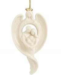 A lovely family of three is being watched over by an angel in this porcelain ornament from Lenox. With gold hanging thread. A lovely family of three is being watched over by an angel in this porcelain ornament from Lenox. With gold hanging thread.