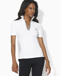 In breathable stretch cotton pique with a chic split neckline, the short-sleeved Edd is the perfect complement to an active lifestyle. In breathable stretch cotton pique with a chic split neckline, the short-sleeved Edd is the perfect complement to an active lifestyle.