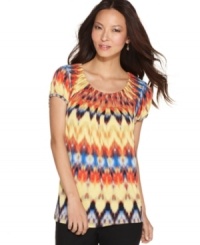 Try a touch of tribal print -- with a truly affordable price -- with Style&co.'s pleated top! The collar and sleeves create just the right amount of volume. Try a touch of tribal print -- with a truly affordable price -- with Style&co.'s pleated top! The collar and sleeves create just the right amount of volume.