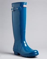 Hunter polishes its classic rain boots to high shine perfection; they're ready to step out rain or shine, city or country.