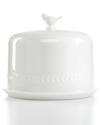 Whiteware gets whimsical. A figural bird and branches sculpted in fresh white porcelain make this Martha Stewart Collection cake dome a charmer on casual tables. Whiteware gets whimsical. A figural bird and branches sculpted in fresh white porcelain make this Martha Stewart Collection cake dome a charmer on casual tables.