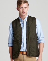 In-vest in a trend-right quilted layer to maximize your seasonal style with this sleek zip-front Barbour vest. Zip out liner can be removed for warmer days. In-vest in a trend-right quilted layer to maximize your seasonal style with this sleek zip-front Barbour vest. Zip out liner can be removed for warmer days.