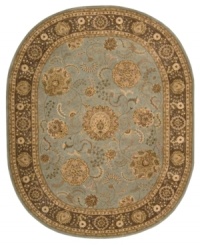 A muted blue field is accented with rich tones of beige and brown on this beautiful rug from Nourison. Incredibly soft New Zealand wool is tufted by hand and highlighted with pure silk for a truly majestic look and feel. A muted blue field is accented with rich tones of beige and brown on this beautiful rug from Nourison. Incredibly soft New Zealand wool is tufted by hand and highlighted with pure silk for a truly majestic look and feel.