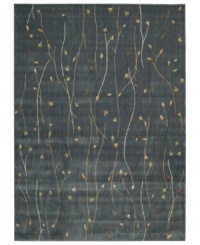 With a flowing floral motif, this area rug offers an organic appeal to your decor. Vines intertwine over a steely blue background, each branch hand-carved to add that extra dimension and eye-pleasing interest. With a flowing floral motif, this area rug offers an organic appeal to your decor. Vines intertwine over a steely blue background, each branch hand-carved to add that extra dimension and eye-pleasing interest.