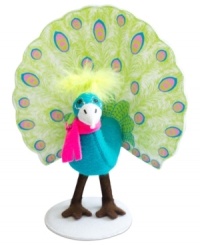 All is bright. Even animals get a little wild around the holidays, like this festively dressed peacock with the soft features and unmistakable whimsy of Annalee figurines. All is bright. Even animals get a little wild around the holidays, like this festively dressed peacock with the soft features and unmistakable whimsy of Annalee figurines.