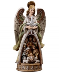 Heralding the birth of baby Jesus, this folk-inspired angel holds the iconic shining star and reveals the story of the nativity. Muted hues and delicate craftsmanship unveil the simplicity of Jesus' birth, as Mary, Joseph, the three kings and two gentle lambs draw near to the newborn babe. Heralding the birth of baby Jesus, this folk-inspired angel holds the iconic shining star and reveals the story of the nativity. Muted hues and delicate craftsmanship unveil the simplicity of Jesus' birth, as Mary, Joseph, the three kings and two gentle lambs draw near to the newborn babe.