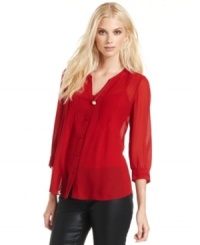 Add a boho-chic look to your wardrobe with this semi-sheer top from Calvin Klein Jeans. Try it with dark jeans for a weekend vibe that stays pulled-together. Add a boho-chic look to your wardrobe with this semi-sheer top from Calvin Klein Jeans. Try it with dark jeans for a weekend vibe that stays pulled-together.