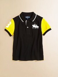 It's game time in this athletic jersey-inspired cotton mesh polo, featuring Ralph Lauren's iconic pony at the chest and twill 3 embellishments.Ribbed polo collarShort sleevesButton-frontEven-vented hemCottonMachine washImported Please note: Number of buttons may vary depending on size ordered. It's game time in this athletic jersey-inspired cotton mesh polo, featuring Ralph Lauren's iconic pony at the chest and twill 3 embellishments.Ribbed polo collarShort sleevesButton-frontEven-vented hemCottonMachine washImported Please note: Number of buttons may vary depending on size ordered.