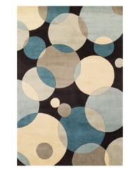 Abstract and absorbing, this rug features a multi-circle pattern in gray, taupe and an array of teal blues. Reminiscent of modern art paintings, it adds striking modernity and grace to your home. Hand-tufted and hand-carved of plush wool. Abstract and absorbing, this rug features a multi-circle pattern in gray, taupe and an array of teal blues. Reminiscent of modern art paintings, it adds striking modernity and grace to your home. Hand-tufted and hand-carved of plush wool.