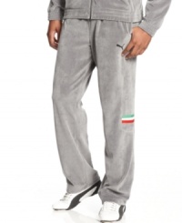 Take the lead and stay ahead of the pack with comfort and style in these velour Ferrari track pants from Puma. Take the lead and stay ahead of the pack with comfort and style in these velour Ferrari track pants from Puma.