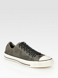 Infused with leather lining and a rubber sole, this stretchy canvas classic is roughened by an unexpected camo print. Leather liningPadded insoleRubber soleImported Infused with leather lining and a rubber sole, this stretchy canvas classic is roughened by an unexpected camo print. Leather liningPadded insoleRubber soleImported