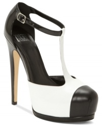The sexy t-strap silhouette of Truth or Dare by Madonna's Feline platform pumps is enhanced by the contrasting black and white straps and cap toe. The sexy t-strap silhouette of Truth or Dare by Madonna's Feline platform pumps is enhanced by the contrasting black and white straps and cap toe.