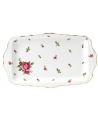 Revive a classic dinnerware pattern with the Vintage sandwich tray. Tiny buds and lush blossoms plucked from Royal Doulton's Old Country Roses collection flower on white bone china with a ruffled gold edge. Revive a classic dinnerware pattern with the Vintage sandwich tray. Tiny buds and lush blossoms plucked from Royal Doulton's Old Country Roses collection flower on white bone china with a ruffled gold edge.