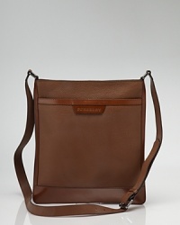 A pebbled leather flat messenger bag accompanies you across town and on your morning commute, adding refinement to your overall look. A pebbled leather flat messenger bag accompanies you across town and on your morning commute, adding refinement to your overall look.