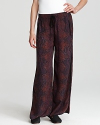 Luxe silk takes on sleek python print in these wide-leg Rebecca Taylor pants. Perfect teamed with a snug fall knit. Luxe silk takes on sleek python print in these wide-leg Rebecca Taylor pants. Perfect teamed with a snug fall knit.