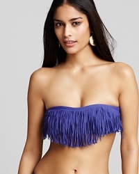 There's something fashion-forward about L*Space's fringed bandeau. Hinting at flirtatious but wholly feminine, this daring suit is destined to stun when you shimmy in the sun. There's something fashion-forward about L*Space's fringed bandeau. Hinting at flirtatious but wholly feminine, this daring suit is destined to stun when you shimmy in the sun.