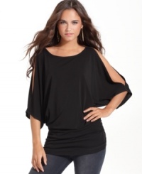 A sexy cut-out design makes the cold shoulder top very hot, by Rachel Rachel Roy. A sexy cut-out design makes the cold shoulder top very hot, by Rachel Rachel Roy.